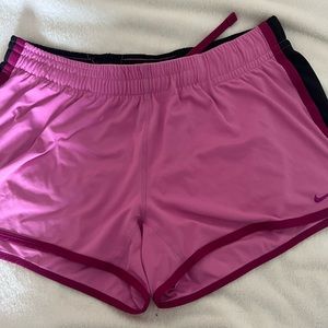 Medium purple Nike dry fit shorts.